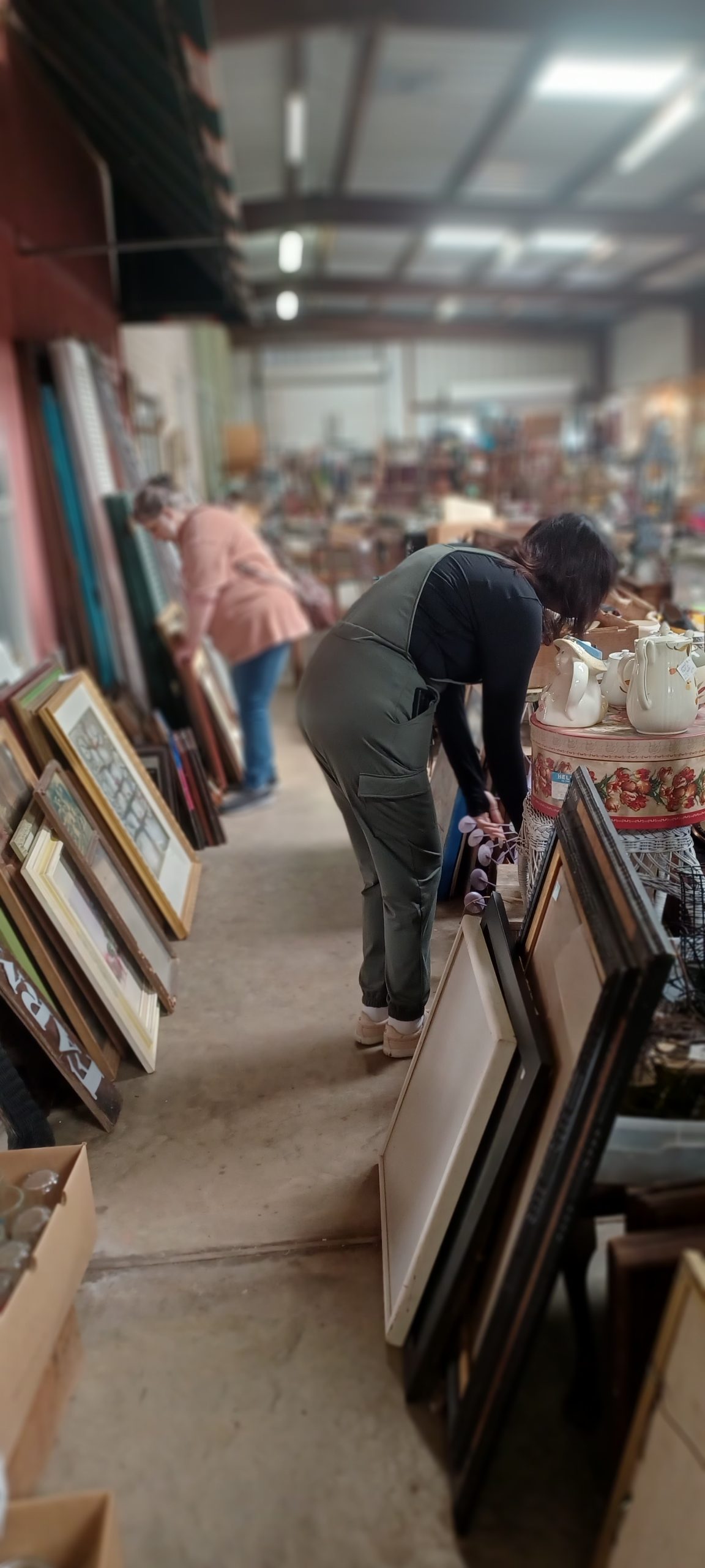 Tina Hodgdon looking through a junk store in Canton Texas
